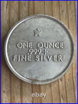 1973 1oz. 999 Fine Silver Swiss America Draper Mint Round Over Struck Design