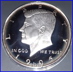 1995 8 Ounce Silver Pure. 999 Fine Bullion John F. Kennedy Round, some toning