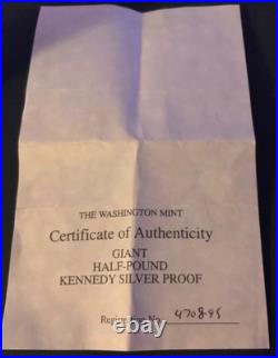 1995 8 Ounce Silver Pure. 999 Fine Bullion John F. Kennedy Round, some toning
