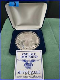 1997 Silver Eagle Bullion 1/2 Troy Pound / 6.58oz. 999 Fine Silver Item# 13 1997 Silver Eagle Bullion 1/2 Troy Pound / 6.58oz. 999 Fine Silver Item# 13