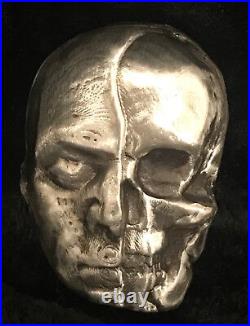 1.75 tr/oz MK BarZ Half Dead-1/2 Man & Skull. 999 fine silver 1.75 tr/oz MK BarZ Half Dead-1/2 Man & Skull. 999 fine silver