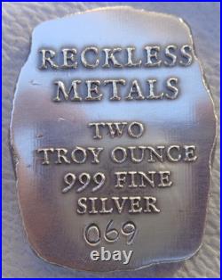 2 oz. THE DEVIL INSIDE numbered antiqued ingot. 999 fine silver
