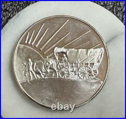 OREGON COAST/COVERED WAGON, 2oz. 999 FINE SILVER ART ROUND, NICE